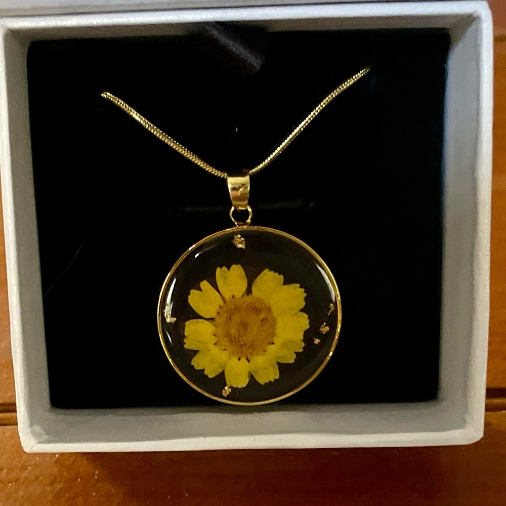 Real pressed flower pendant on a 16” gold plated chain with 4” extender